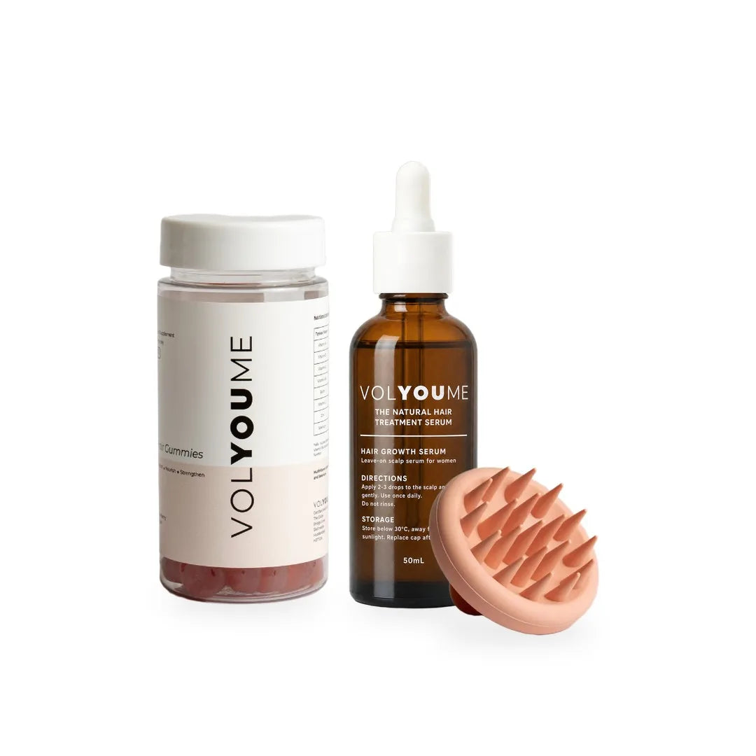The Volyoume Starter Kit: the Hair Growth Serum, a jar of Hair Support Gummies and the scalp massager